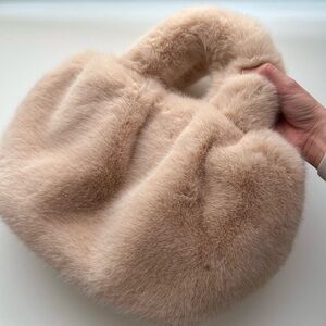 Plush faux fur bag in peach